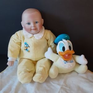 DISNEY VINTAGE ASHTON DRAKE  Porcelain Bisque doll w/ Baby Donald Duck 14".